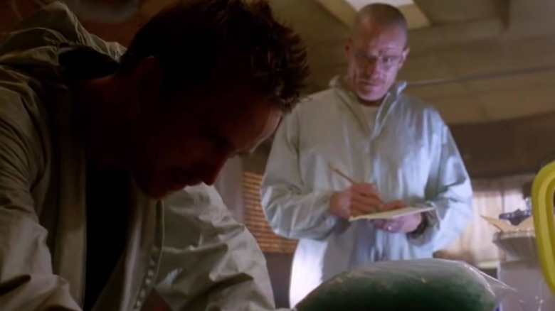 Jesse and Walt weighing meth