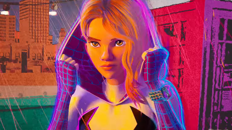 Gwen Stacy pulling on her Spider-suit's hood