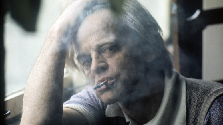 Klaus Kinski smoking