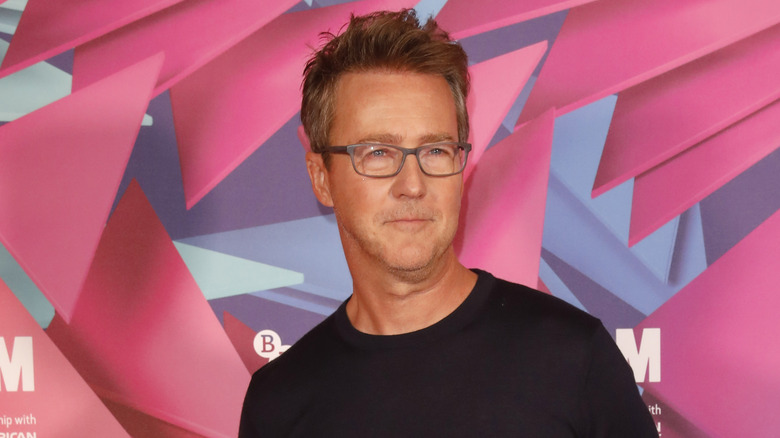 Edward Norton wearing glasses