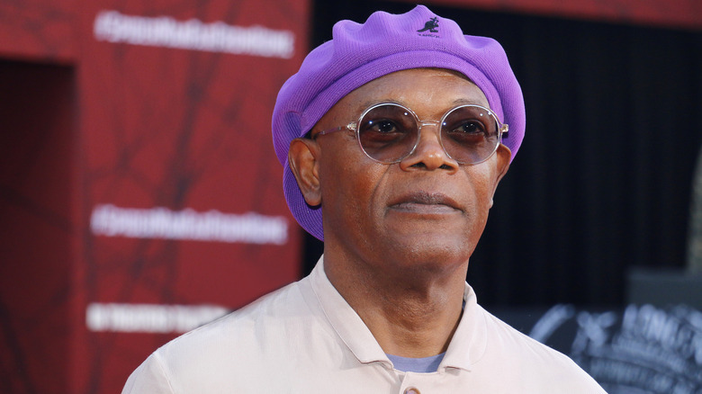 Samuel L. Jackson wearing purple cap