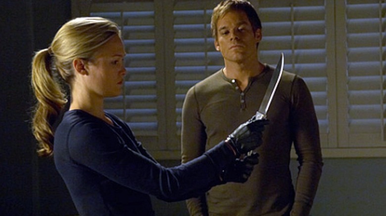 Lumen and Dexter examine a knife in "Dexter"