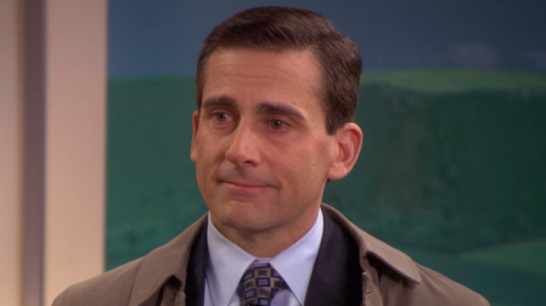 Michael Scott smiles at his staff on "The Office"