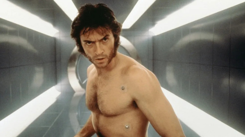 Wolverine standing in X-Men hallway shirtlesss