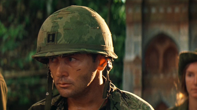 Captain Benjamin L. Willard wearing army helmet in Vietnam