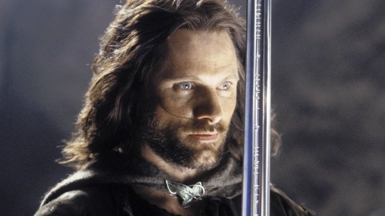 Aragorn holding the King's sword