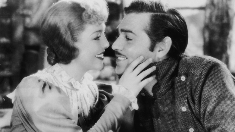 Loretta Young and Clark Gable smiling