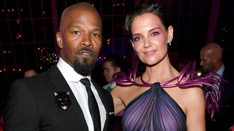 Jamie Foxx and Katie Holmes smiling