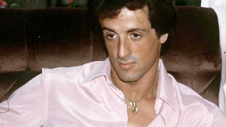 Sylvester Stallone wearing pink shirt