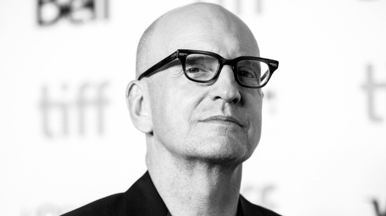 Steven Soderbergh wearing confident expression