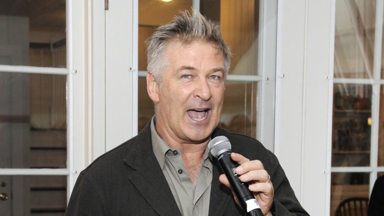 Alec Baldwin speaking with a microphone