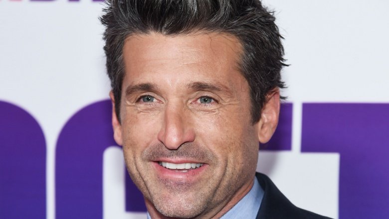 Patrick Dempsey smiling for the press