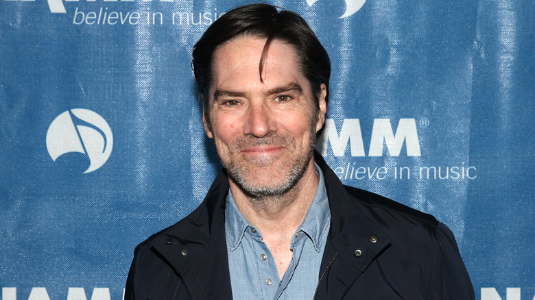 Thomas Gibson smiles at a press event