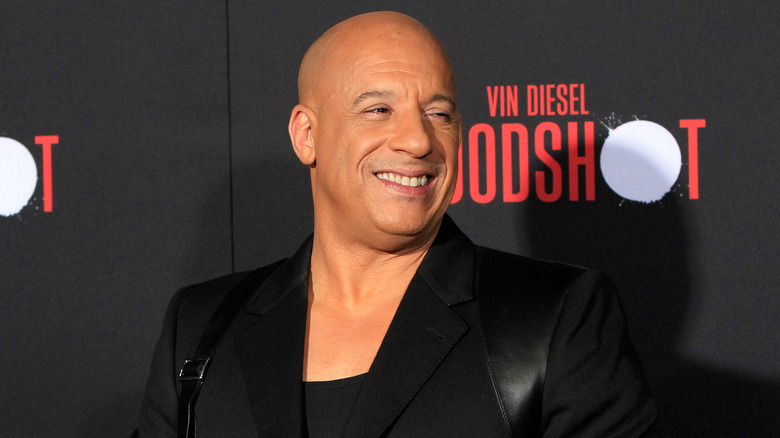 Vin Diesel smiling at a Bloodshot photo opp