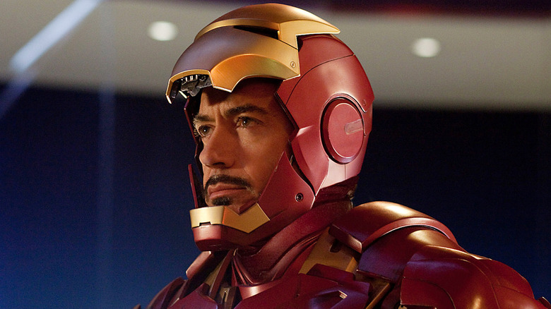 Tony Stark wears the Iron Man costume in 