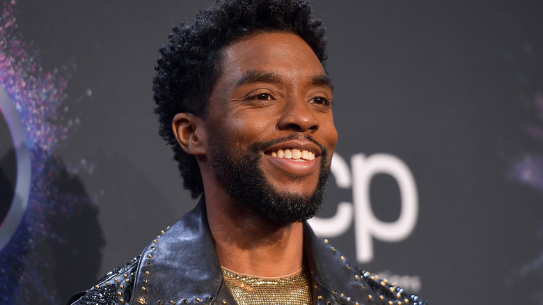 Chadwick Boseman smiles