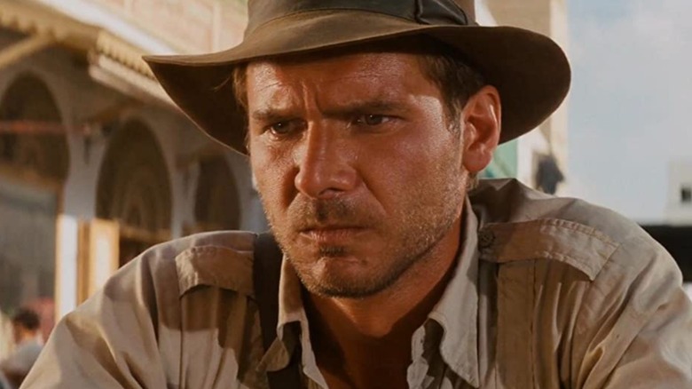 Harrison Ford scowls as Indiana Jones