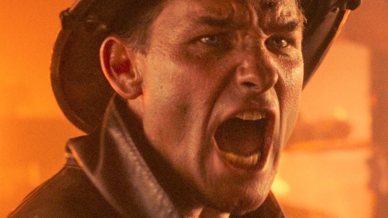 Kurt Russell screams as Bull