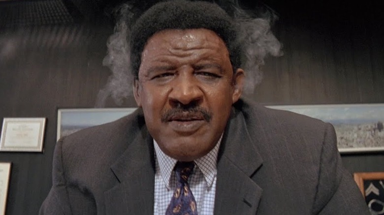 Frank McRae with smoking ears