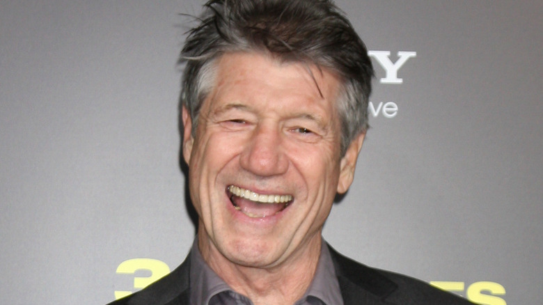 Fred Ward smiling hugely