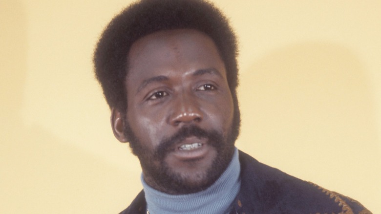 Young Richard Roundtree gazing sideways