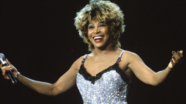 Tina Turner smiling onstage