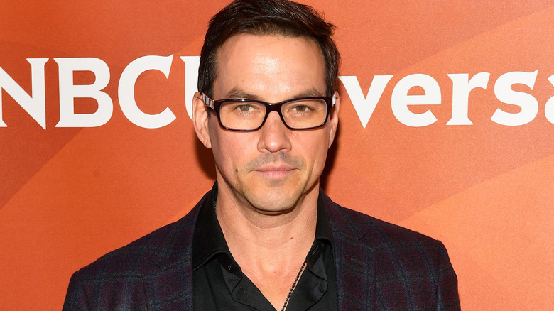 Tyler Christopher wearing black glasses