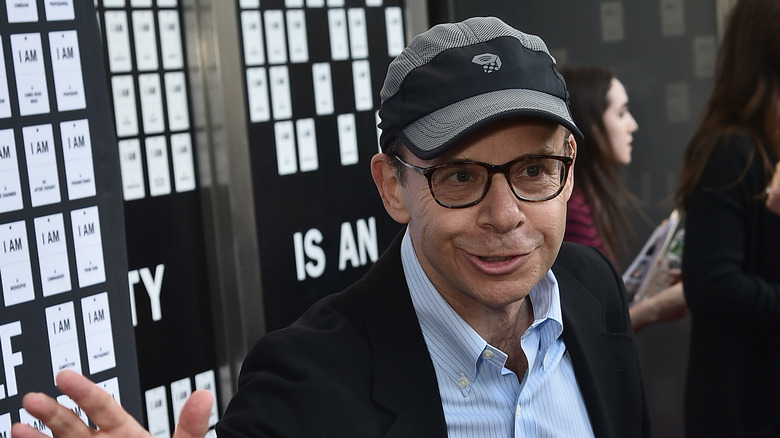 Rick Moranis waving