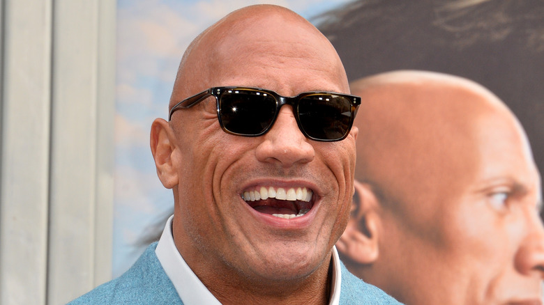 Dwayne Johnson smiling, sunglasses