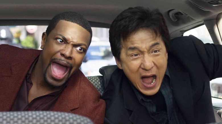 Carter and Lee scream in the back of a car in "Rush Hour" (1998)