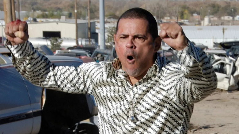 Tuco yelling putting fists in air