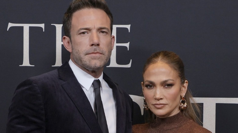 Ben Affleck standing with Jennifer Lopez