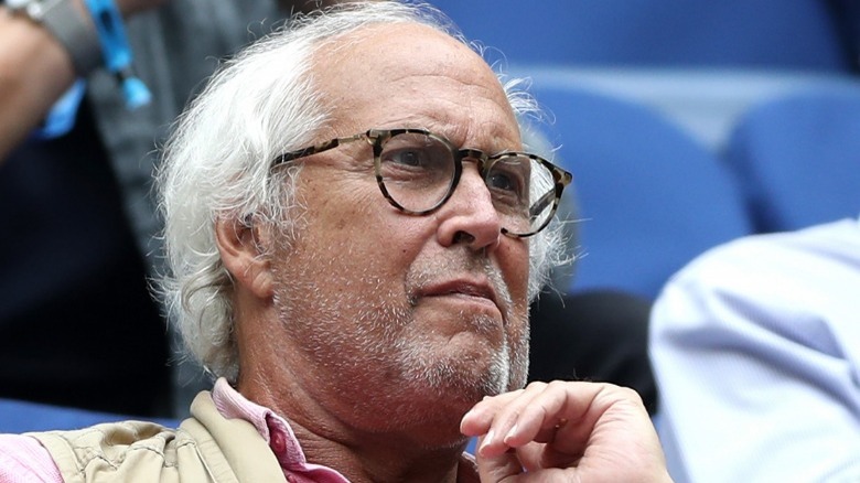 Chevy Chase at a tennis match