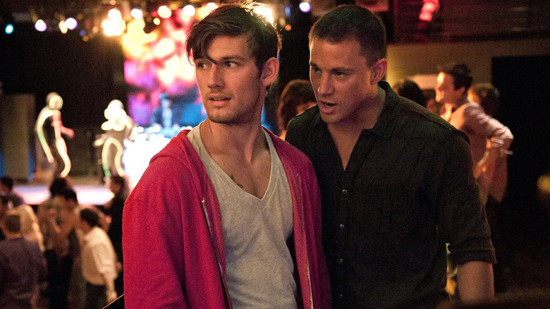 Michael (Channing Tatum) and Adam (Alex Pettyfer) in a club in Magic Mike