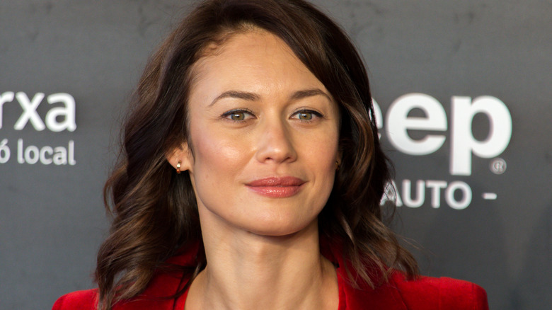 Olga Kurylenko smiles for camera