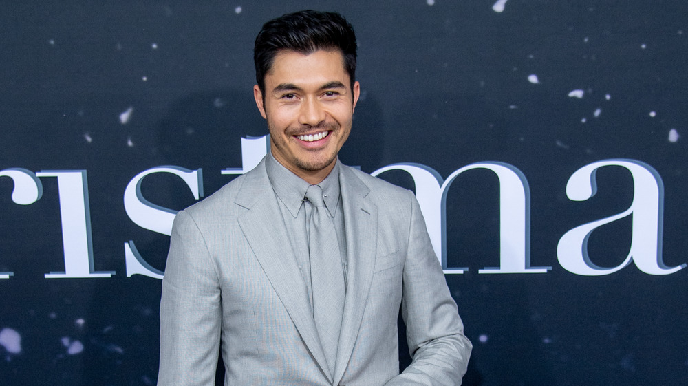 Henry Golding smiling