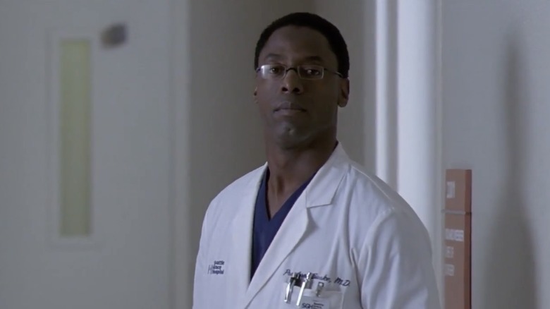 Preston Burke walks through hospital