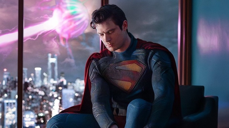 Superman putting his suit on