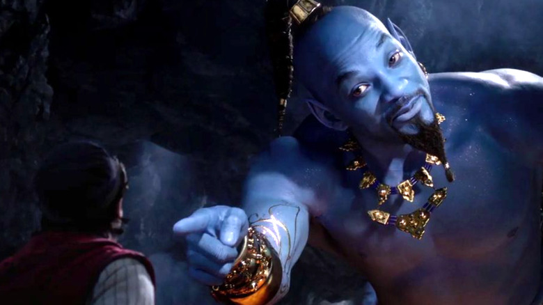 Aladdin's Will Smith pointing at a boy 