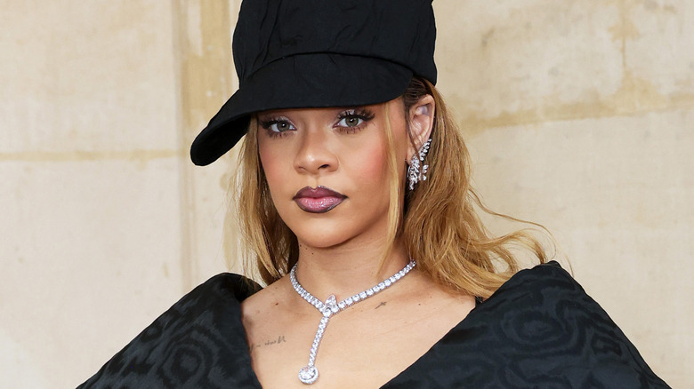 Rihanna wears an oversized hat