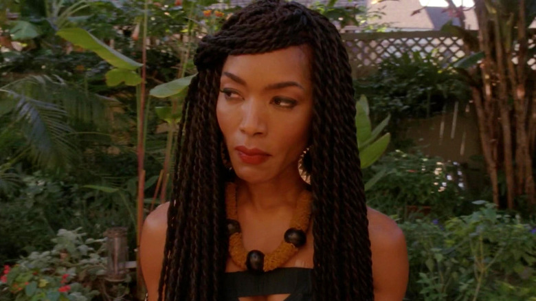 Angela Bassett as Marie Laveau