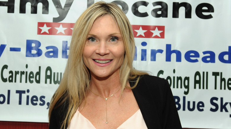 Amy Locane smiling