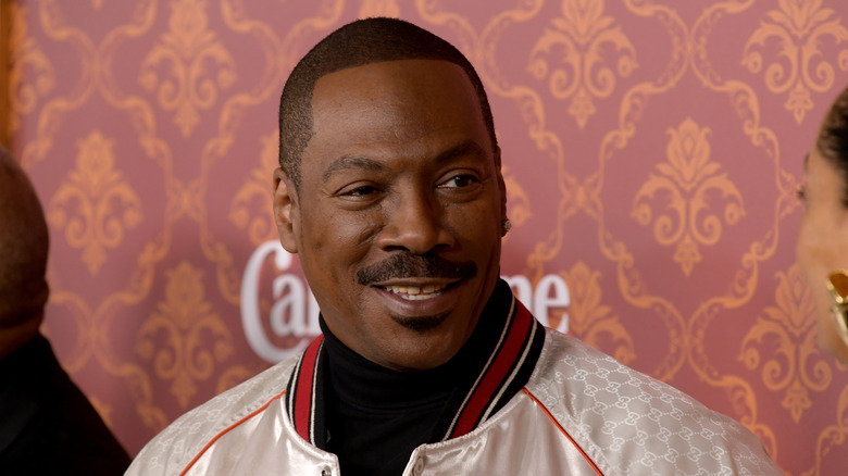 Eddie Murphy smiling at event