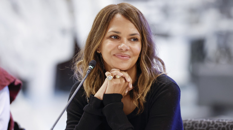 Halle Berry smiling wearing black