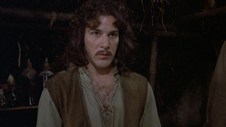 Inigo Montoya standing in hut