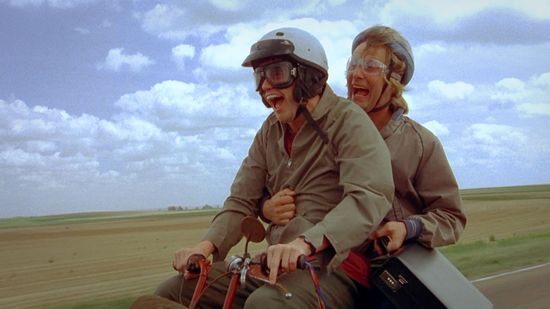 Harry and Lloyd on motorcycle