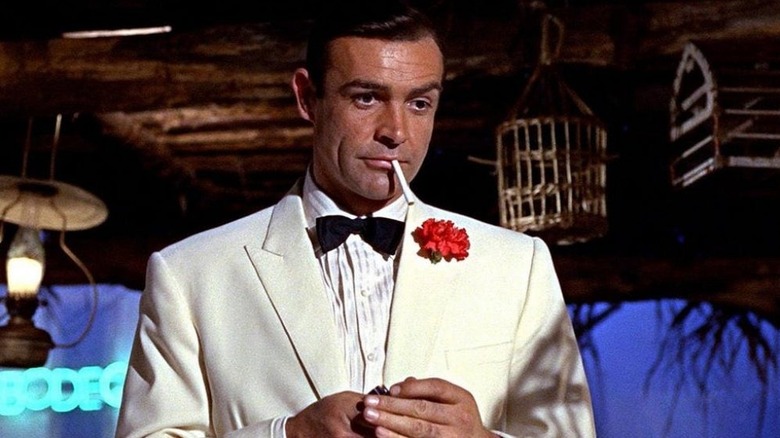 James bond smokes a cigarette