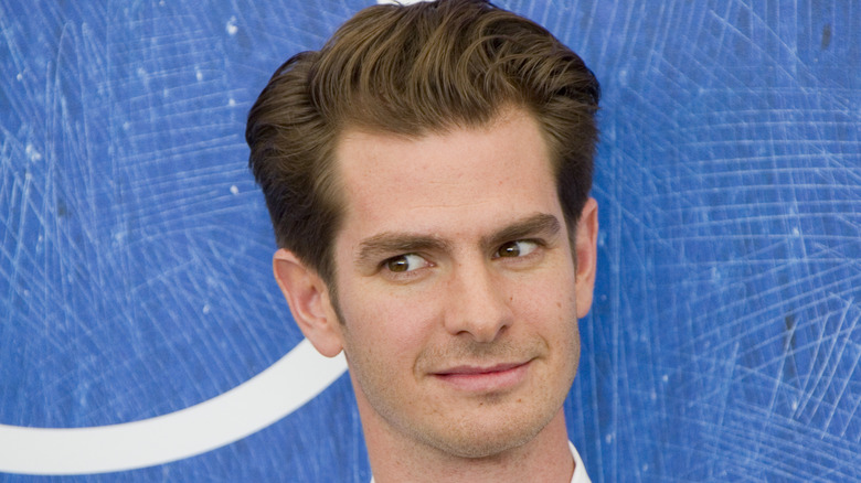 Andrew Garfield gives a sidelong glance