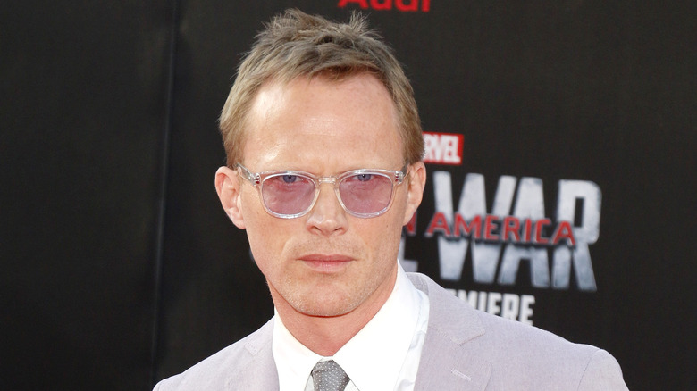 Paul Bettany wears tinted glasses