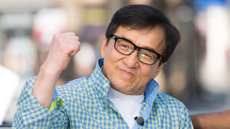 Jackie Chan makes a fist